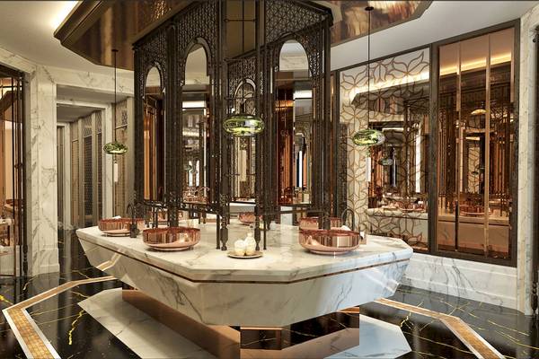 Rixos Premium Saadiyat Island Badezimmer mit Marmortisch und Kupferbecken.