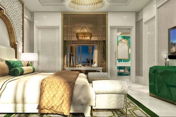 Luxuriöses Schlafzimmer im Rixos Premium Saadiyat Island Hotel mit Meerblick.