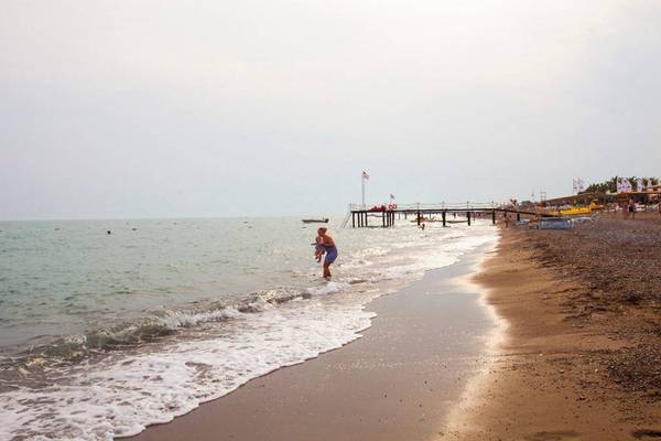 Familie am Strand von Orange County Belek - Family Concept
