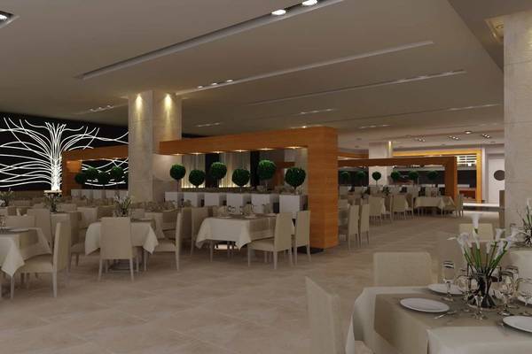 Innenbereich des Restaurants im Side Sunport Hotel & Spa mit gedeckten Tischen und illuminierter Wand