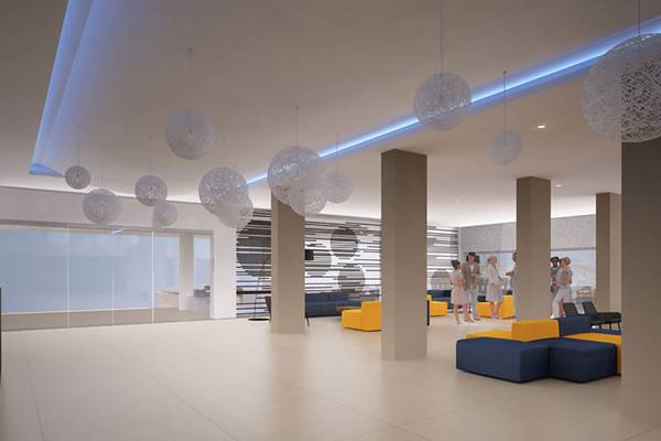 Innenansicht der Lobby im Nelia Beach Hotel & Spa mit runden Lampen und modularen Sitzbereichen.