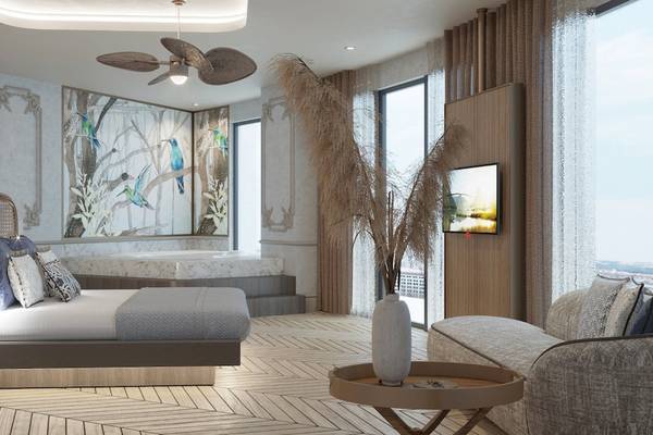 Luxus Schlafzimmer im Liu Resorts mit Badewanne, Fernseher, Bett und Wohnzimmerbereich.