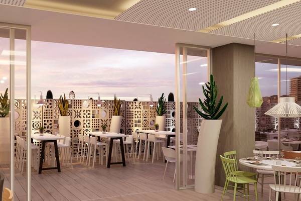 Innenansicht des Restaurants im Abora Interclub Atlantic by Lopesan Hotels mit modernen Möbeln und Pflanzen.