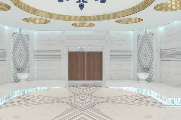 Innenraum Design des Lago Hotels mit Marmorboden, weißen Wänden und goldenen Deckenelementen.