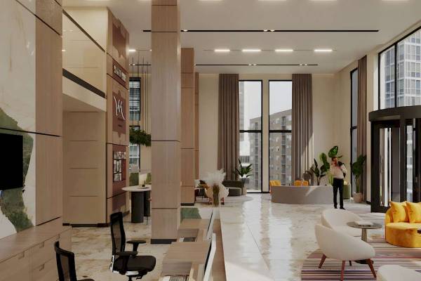 Lobby des Mövenpick Hotel Lalez Durres mit Sitzbereichen und Empfangstresen.
