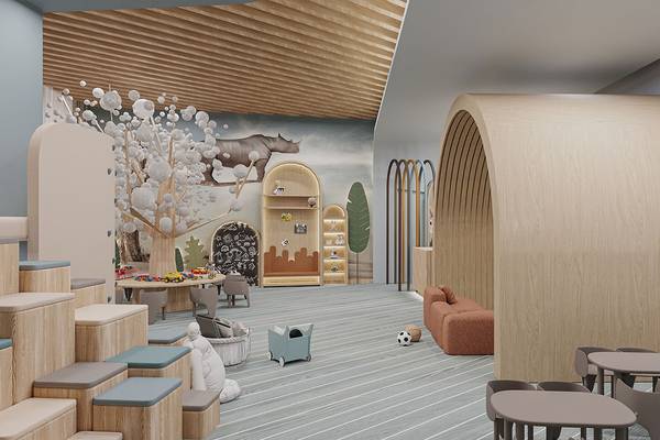 Kinderzimmer im Gloria Serenity Resort mit weichen Möbeln und einer Wandmalerei.