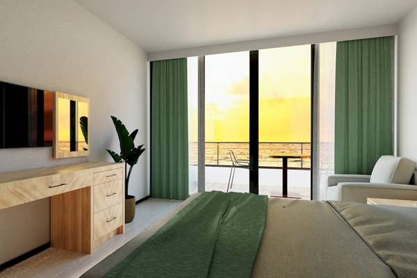 Modernes Schlafzimmer mit Balkon und Meerblick im Sunrise Queen Luxury Hotel.