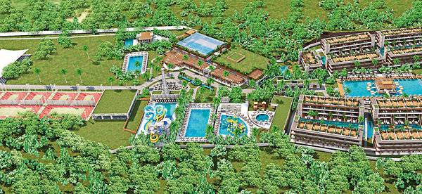 Luftaufnahme des Aldiana Club Side Beach Resorts mit Pools, Tennisplätzen und Gebäuden.