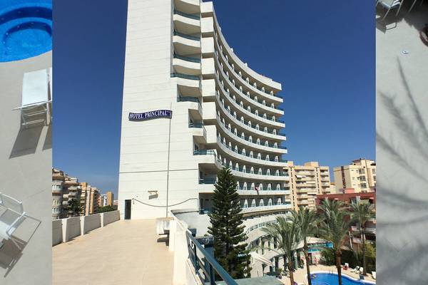 Foto des Hotel Principal von außen, mit Swimmingpool und Gebäuden im Hintergrund