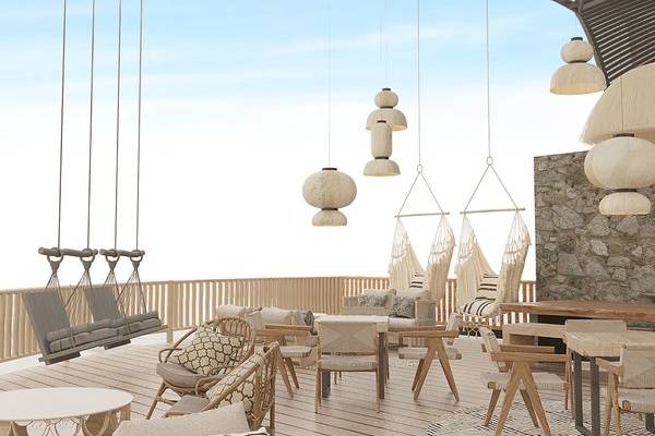 Ethno Belek Hotel Terrasse mit Holzmöbeln, Hängesesseln und Hängeschaukeln.