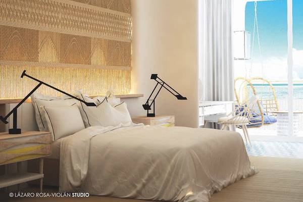 Schlafzimmer im Fariones Hotel mit Blick auf das Meer und einer Hängeschaukel
