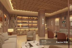 Loungebereich im Hipotels Hipocampo Palace mit Sofas, Tischen und Dekor.