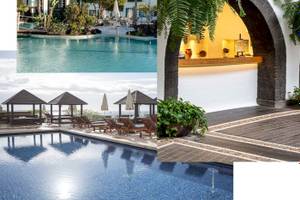 Livvo Volcan Lanzarote Hotel zeigt Pool, Terrassen und Gebäude.