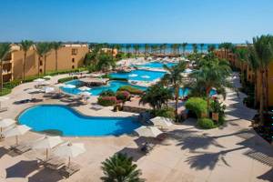 Stella Gardens Resort & Spa Makadi Bay: Pool mit mehreren Wasserbereichen und Liegebereichen