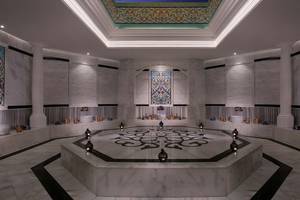 Spa-Bereich im Anantara The Palm Dubai Resort mit Marmorwänden, zentralen Wasserbecken und dekorativen Wandmalereien.