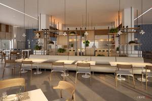 Innenansicht des Restaurants im NissiBlu Beach Resort mit modernem Design, Tischen, Stühlen und Pflanzen.