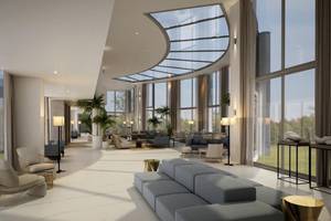 Innenansicht der Lobby im NissiBlu Beach Resort mit großen Fenstern und modernen Möbeln.