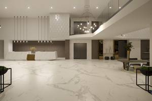 Lobby des NissiBlu Beach Resorts mit Marmorboden und moderner Einrichtung.