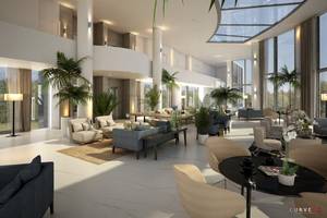 Lobby des NissiBlu Beach Resorts mit modernen Möbeln, großen Fenstern und Pflanzen.