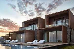 Außenbereich des Maxx Royal Kemer Resorts mit modernen Gebäuden und Swimmingpool