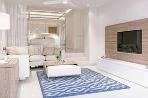 Radisson Blu Beach Resort in Kreta, Suite Sofa TV