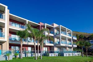 Außenansicht des Michelangelo Resort & Spa mit mehreren Stockwerken und Balkonen