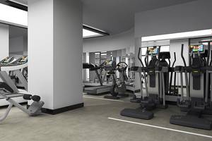 Fitnessstudio im Rixos Premium Seagate mit moderner Ausstattung und Laufbändern.