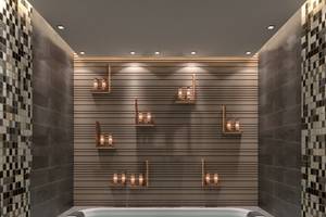 Innenansicht des Badezimmers im Belad Bont Resort mit Badewanne und dekorativen Wandleuchten.