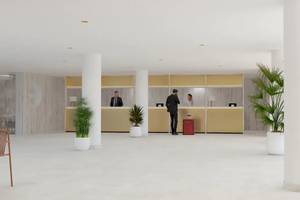 Innenansicht des Sol Fuerteventura Jandia Hotels mit Rezeption und Gästen.