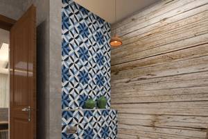Ein Badezimmer mit blau-weißen geometrischen Fliesen und einer Holzwand.