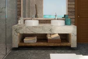 Badezimmer im You & Me Maldives Hotel mit Marmor-Waschtisch und Holzwand.
