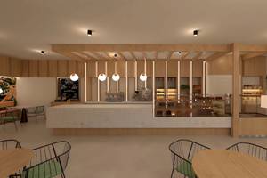 Innenansicht des Cafés im Sunscape Dominicus La Romana mit modernen Holzmöbeln, einer Theke und Tisch-Sets.