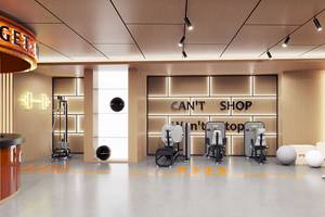 Innenansicht des Fitnessstudios im Gloria Serenity Resort mit moderner Ausstattung und einer 'Can't Shop' Wand.