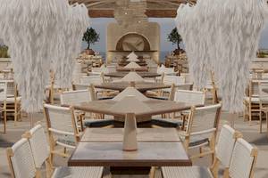 Außenterrasse des Sunrise Queen Luxury Hotel mit vielen Tischen und Stühlen.