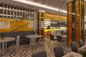 Innenansicht des Restaurants des Sunrise Queen Luxury Resort & Spa mit gelben Wänden und geometrischem Bodenmuster.