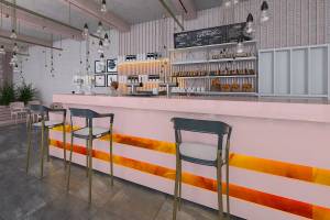 Innenansicht des The Daily Cafe mit rosa Tresen, orange-gelben Akzenten, Barhockern und beleuchteten Lampen.