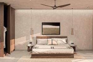 Innenansicht des Schlafzimmers im Aldiana Club Naga Bay mit Doppelbett, Holzschrank und Deckenventilator.