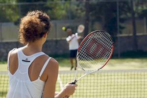 Tennisspieler im Pilot Beach Resort