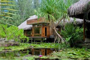Le Bora Bora by Pearl Resorts Hütte inmitten von Seerosen